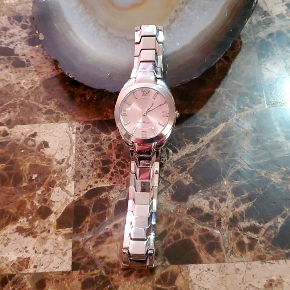Water Resistant ladies Watch 7 1/2 Silver with light Pink face